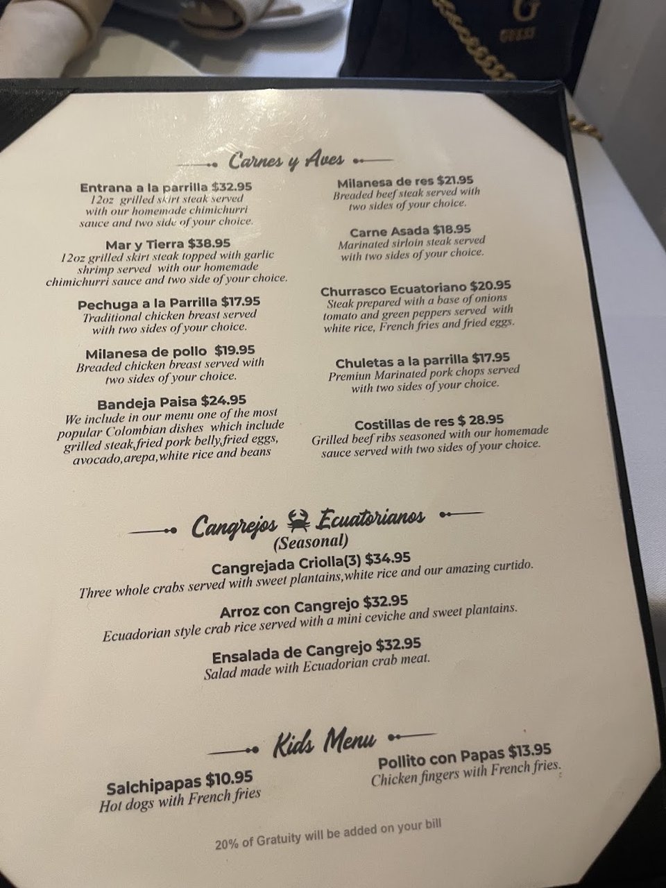 Menu board showing drinks and main dishes.